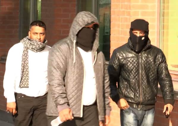 Men accused of involvement in child sexual exploitation offences arrive at Sheffield Crown Court