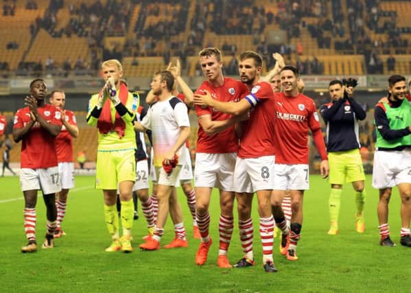 Barnsley's players celebrate after their 4-0 victory over Wolves. Picture: Nigel French/PA.