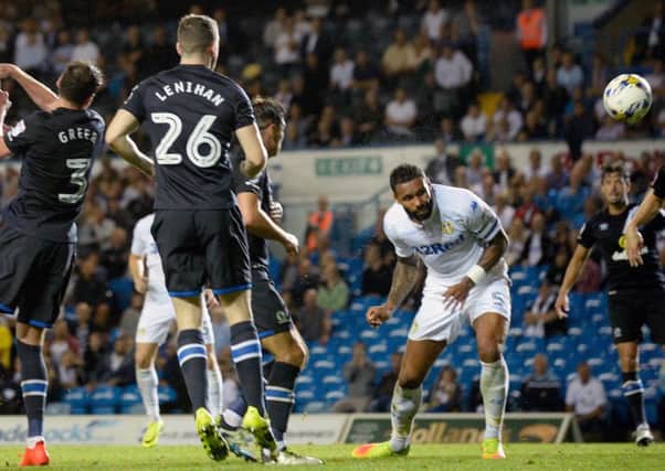 Kyle Bartley heads in Leeds' winning goal against Blackburn Rovers.  Picture Bruce Rollinson