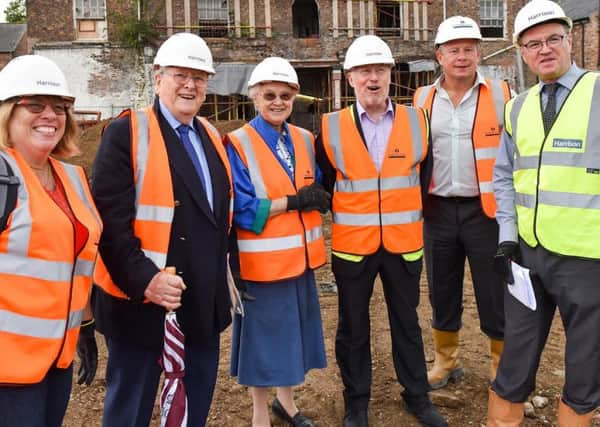 HISTORIC SITE: (L-R) Angie Creswick, Peter Addyman, June Hargreaves, Dr David Fraser, from York Civic Trust; Tony Bowes, of Robertson Construction, and Chris Hale, of S Harrison.