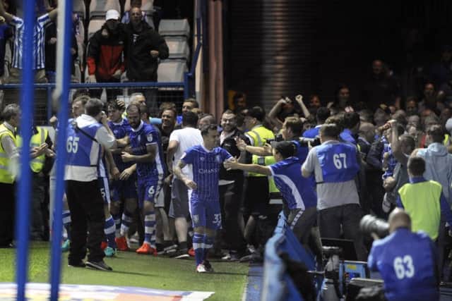 Joyous scenes at Hillsborough on Tuesday night after Kieran Lee's winning goal. Picture: Steve Ellis.
