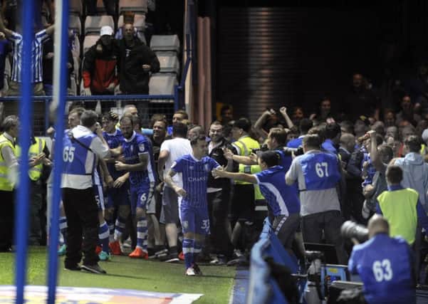 Joyous scenes at Hillsborough on Tuesday night after Kieran Lee's winning goal. Picture: Steve Ellis.