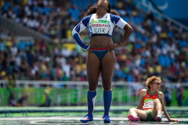 Leeds's Kadeena Cox (left) reacts after winning the Women's 400m - T38 Final at the Olympic Stadium.