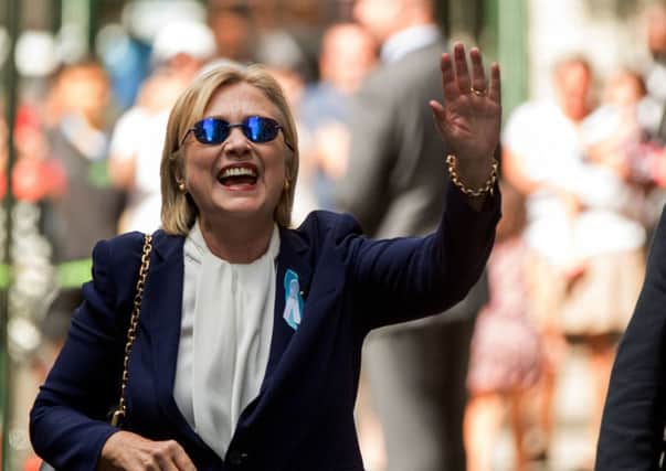 Hillary Clinton leaves her daughter Chelsea's apartment shortly after 'overheating' at a 9/11 memorial ceremony, prompting fresh health concerns.