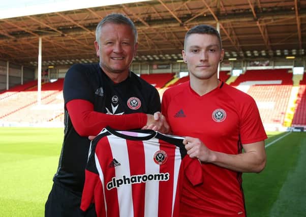Chris Wilder welcomes new Blades signing Caolan Lavery.