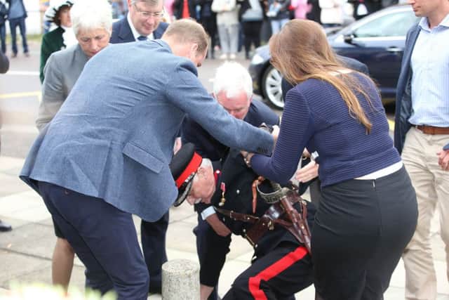 The Duke of Cambridge comes to the aid of Jonathan Douglas-Hughes, Vice Lord-Lieutenant of Essex when he took a tumble as he arrived at Stewards Academy in Harlow, Essex, where he and his wife the Duchess of Cambridge are promoting their Heads Together campaign, are finding out how young people are coping with life's pressures. PRESS ASSOCIATION Photo. Picture date: Friday September 16, 2016. See PA story ROYAL Cambridges. Photo credit should read: Ian Vogler/Daily Mirror/PA Wire
