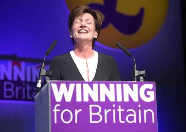 Eyes wide shut: Diane James celebrates after being named as the new leader of Ukip