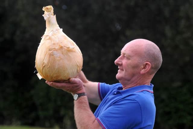Joe Atherton from Mansfield, winner of the heaviest onion.