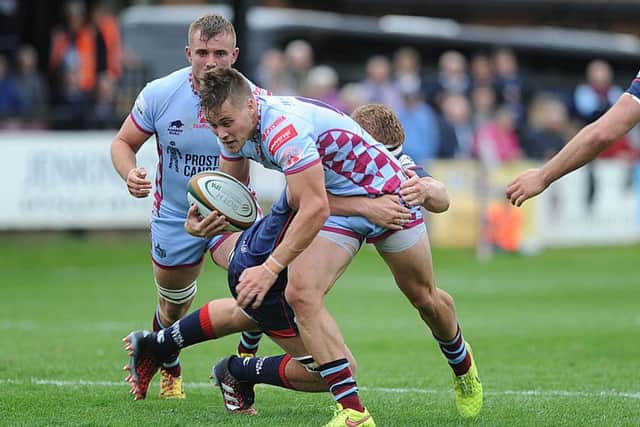 BREAK ON THROUGH: Rotherham Titans' Charlie Foley finds a chink in the London Scottish defence. Picture: Scott Merrylees