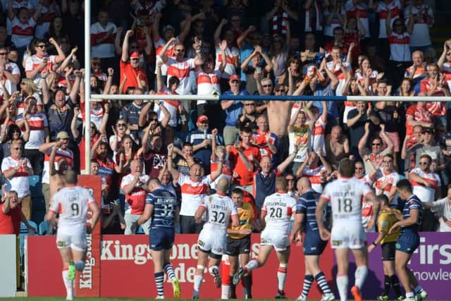 Hull KR's fans celebrates after a try by James Greenwood.