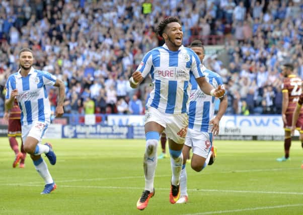 Kasey Palmer celebrates scoring Huddersfield Town's opening goal against QPR.  Picture Bruce Rollinson