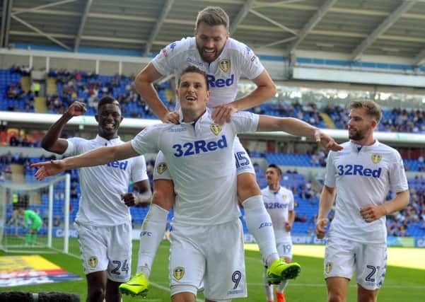 Chris Wood celebrates his penalty goal which put Leeds United in front at Cardiff City. Picture: Tony Johnson.