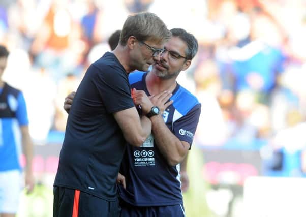 BEST FRIENDS: Huddersfield Town manager David Wagner with his Liverpool counterpart Jurgen Klopp. Picture: Tony Johnson.