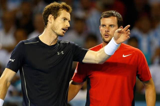Great Britain's Andy Murray (left)and captain Leon Smith during day three of the Davis Cup semi-final against Argentina. Picture: Jane Barlow/PA.