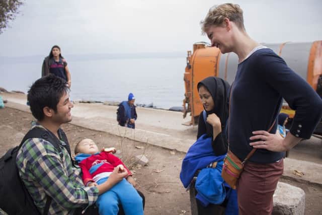 Yvette Cooper MP  talking to refugees on the island of Lesbos.