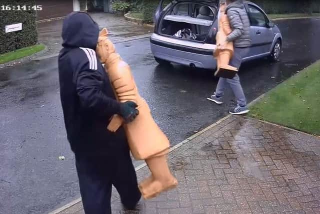 CCTV footage appears to capture the theft of statues from a Leeds driveway.