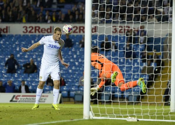 Chris Wood steers his header past Blackburn goalkeeper David Raya to win the match for Leeds United (Picture: Bruce Rollinson).