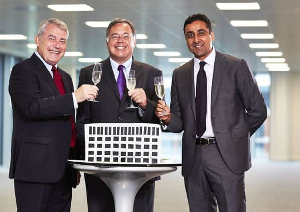 Moving in  (from left) Ward Hadaway commercial partner Philip Jordan, Ward Hadaway managing partner Jamie Martin and executive partner for Ward Hadaway's Leeds office Harmajinder Hayre celebrate the move to the law firm's new home at 5 Wellington Place.