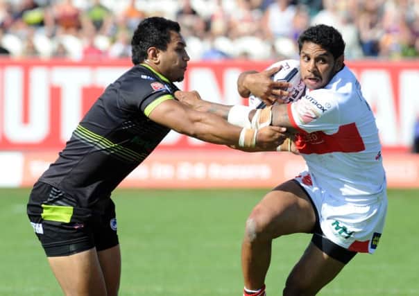Albert Kelly of Hull KR tries to shake off Chris Ulugia of Batley (Picture: Steve Riding)