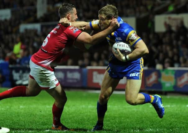 Leeds Rhinos' Jimmy Keinhorst is tackled by Leigh Centurions Martyn Ridyard (Picture: Jonathan Gawthorpe).