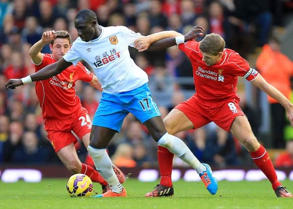 Hull City's Mohamed Diame (centre) in action with Liverpool's Steven Gerrard (right) and Joe Allen during the Barclays Premier League match at Anfield in 2014 (PA)