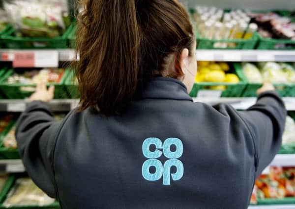 The Co-op says its turnaround strategy is working despite profits falling by more than half.   Picture: Jon Super
