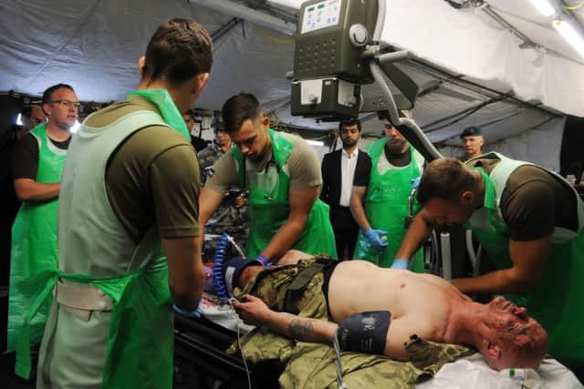 International visitors see a 52-bed tented field hospital in Dishforth, North Yorkshire and meet the medics who go on stand-by to deploy with it. Pictures: Tony Johnson.