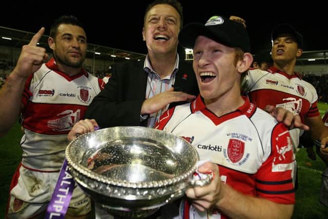 Hull KR's coach Justin Morgan (centre), Byron Ford (left) and James Webster celebrate victory over Widnes following the LHF Healthplan League One Grand Final at the Halliwell Jones Stadium, Warrington. PRESS ASSOCIATION Photo. Picture date: Sunday October 8, 2006. Hull Kingston Rovers beat Widnes 29-16 in the National League One Grand Final at Warrington to secure promotion to Super League after a 12-year absence.