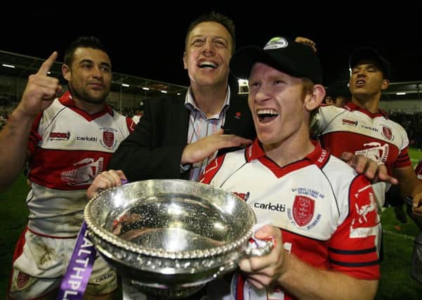 Hull KR's coach Justin Morgan (centre), Byron Ford (left) and James Webster celebrate victory over Widnes following the LHF Healthplan League One Grand Final at the Halliwell Jones Stadium, Warrington. PRESS ASSOCIATION Photo. Picture date: Sunday October 8, 2006. Hull Kingston Rovers beat Widnes 29-16 in the National League One Grand Final at Warrington to secure promotion to Super League after a 12-year absence.