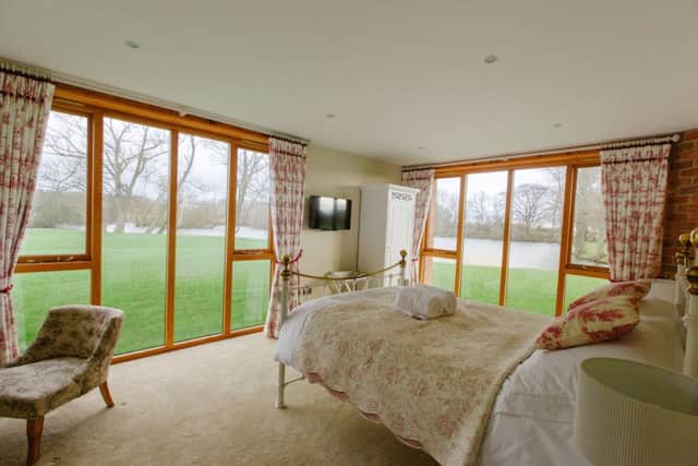 One of the bedrooms overlooking the lake
