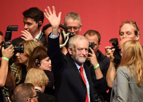 Jeremy Corbyn celebrates retaining the Labour leadership