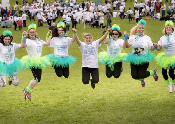 Alzheimer's Society Memory Walk Leeds 24th Sept 2016. Tutu team - Catherine Green (2nd from right) walked with family and friends for her dad Eric who lived with dementia for 7 years