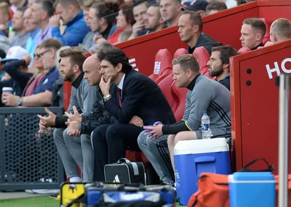 Middlesbrough manager Aitor Karanka sits on the dugout bench during his sides home defeat to Tottenham at The Riverside Stadium.