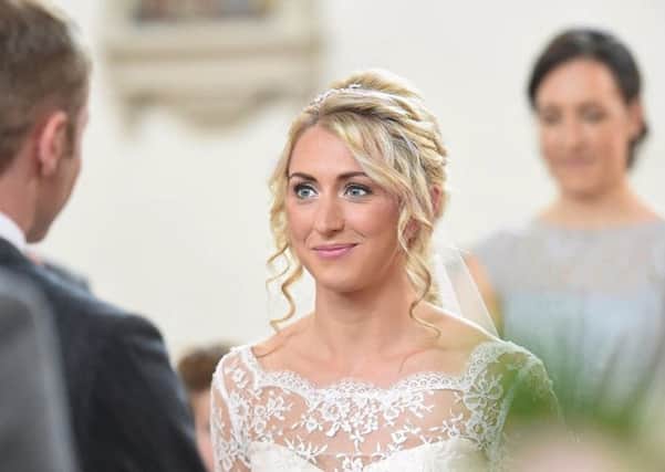 Olympic Gold medalists Jason Kenny and Laura Trott during their wedding ceremony at St Alban's Catholic Church in Macclesfield. PIC: Joe Gardner