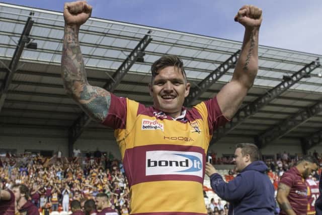 Huddersfield's Danny Brough celebrates after his drop goal was the difference between his team and Hull KR as Huddersfield stay in Super League for 2017.