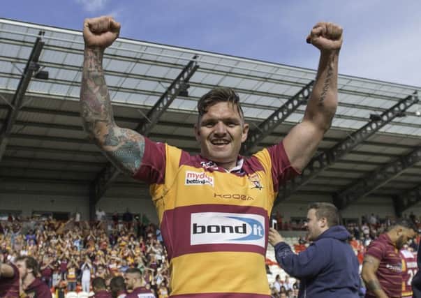 Huddersfield's Danny Brough celebrates after his drop goal was the difference between his team and Hull KR as Huddersfield stay in Super League for 2017.
