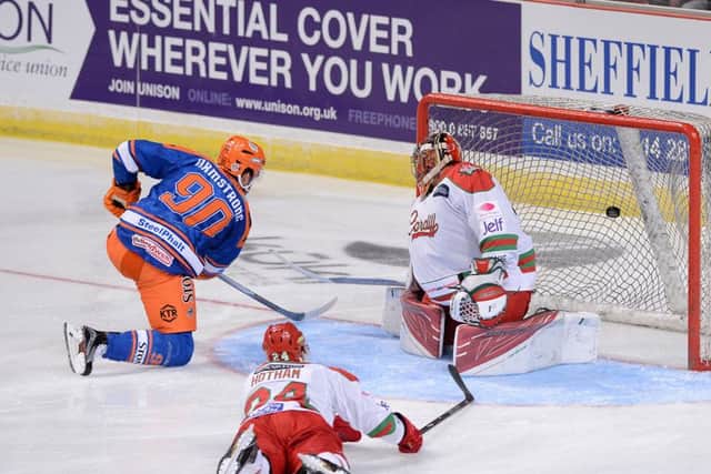 STRIKE ONE: Sheffield Steelers' John Armstrong scores the first of his two goals against Cardiff Devils on Sunday night. Picture: Dean Woolley.