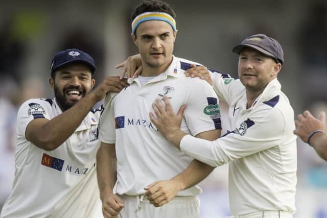 Yorkshire's Jack Brooks celebrates with Azeem Rafiq and Adam Lyth after dismissing Nottinghamshire's Jake Libby first ball. (Picture: SWPix.com)
