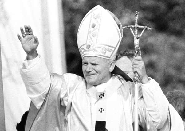 Pope John Paul II conducting the open air mass at Dublin's Phoenix Park, Ireland.  Photo: PA