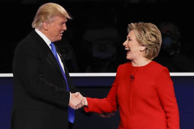 Republican presidential nominee Donald Trump shakes hands with Democratic presidential nominee Hillary Clinton after the first presidential debate. (AP Photo/David Goldman)