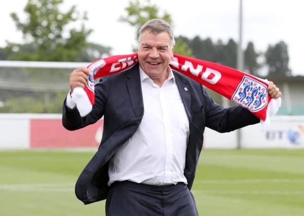HAPPY DAYS: Sam Allardyce celebrating being appointed as England manager. The joy wasn't to last for long. Picture: Martin Rickett/PA.
