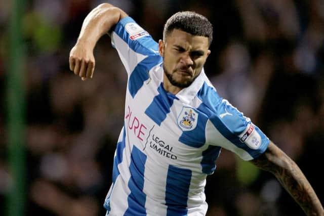 Huddersfield Town's Nahki Wells celebrates scoring his side's second goal of the game during the Sky Bet Championship  match (Photo: PA)