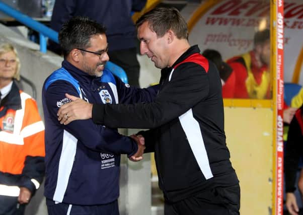 Huddersfield Town manager David Wagner (left) and Rotherham United manager Alan Stubbs before the Sky Bet Championship  match at the John Smith's Stadium, Huddersfield. (Photo: PA)