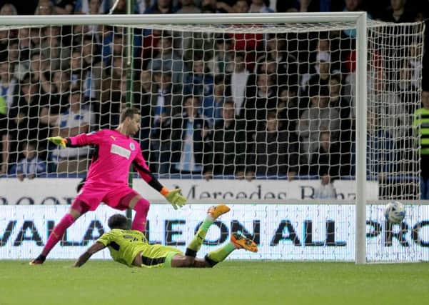 Rotherham United's Tom Adeyemi heads wide against Huddersfield Town (Picture: Richard Sellers/PA Wire).