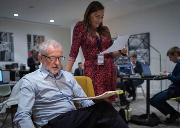 Labour leader Jeremy Corbyn prepares his keynote speech in his hotel, which he will deliver on Wednesday during the Labour Autumn Conference. Stefan Rousseau/PA Wire