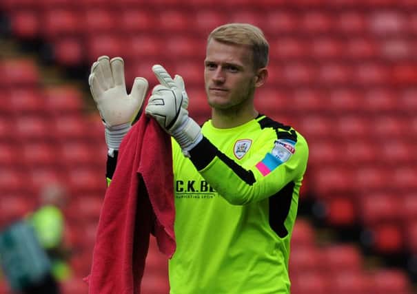 Adam Davies, the Barnsley goalkeeper, was relieved to see Sam Winnall equalise against Aston Villa.