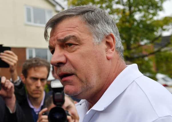GONE: Sam Allardyce speaks to the media outside his home in Bolton earlier this week. Picture: Dave Howarth/PA