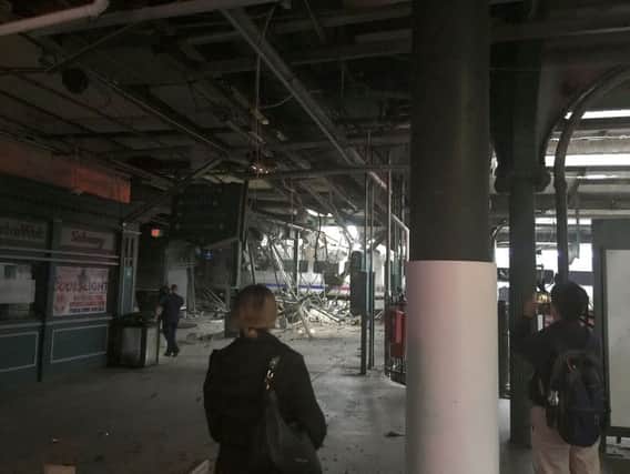 The scene in Hoboken, New Jersey, after a commuter train crashed into the rail station.