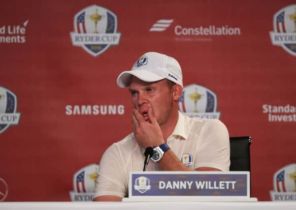 Yorkshireman Danny Willett was in sombre mood as he faced questions on final practice day at the Ryder Cup about an article by his brother Peter, in which USA fans were described as a braying mob of imbeciles (Picture: Peter Byrne/PA).