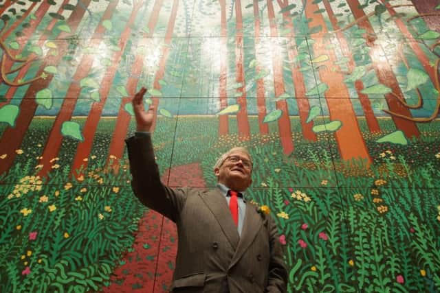 David Hockney with his painting 'The Arrival of Spring in Woldgate, East Yorkshire in 2011